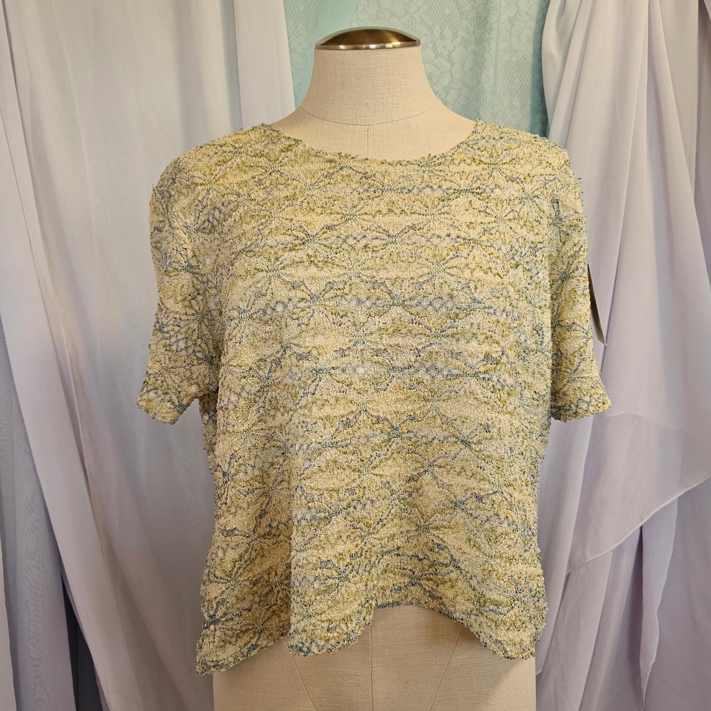 george blue and green textured top