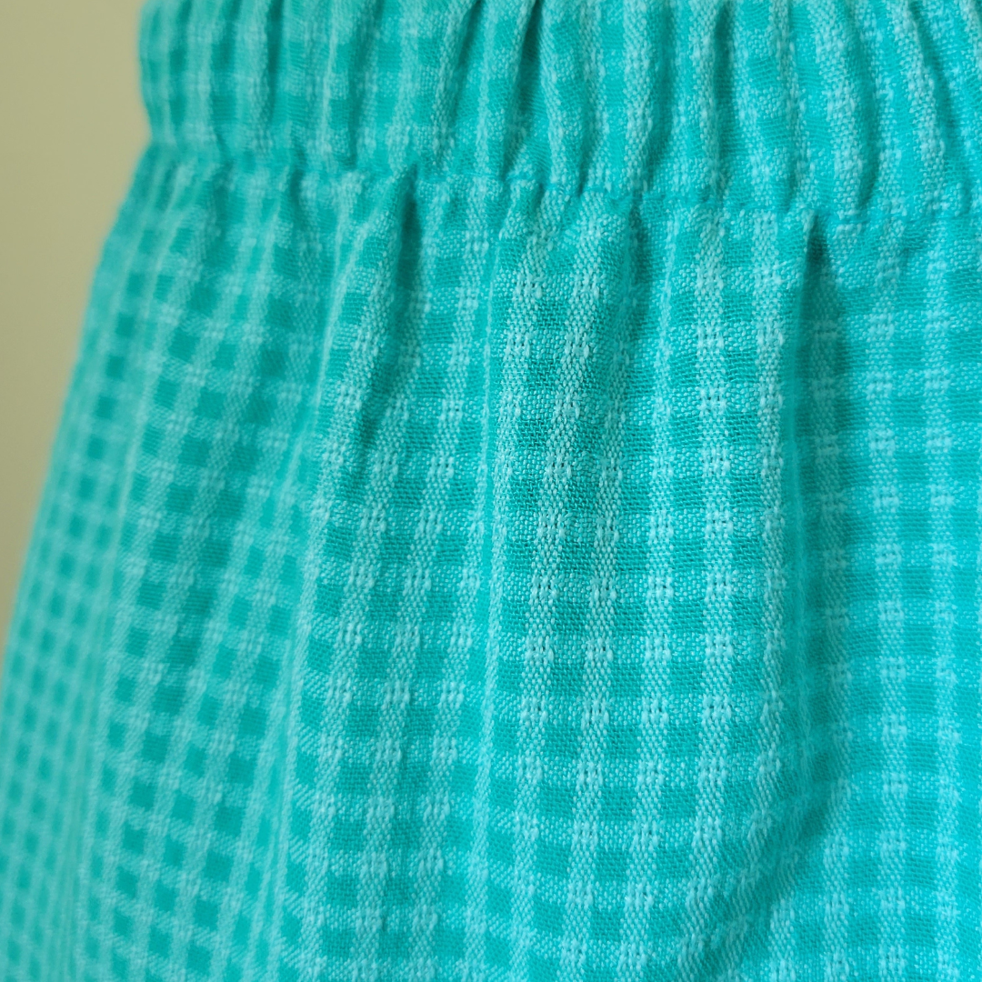 teal blue checkered skirt