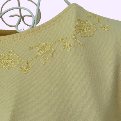 yellow embroidered tee