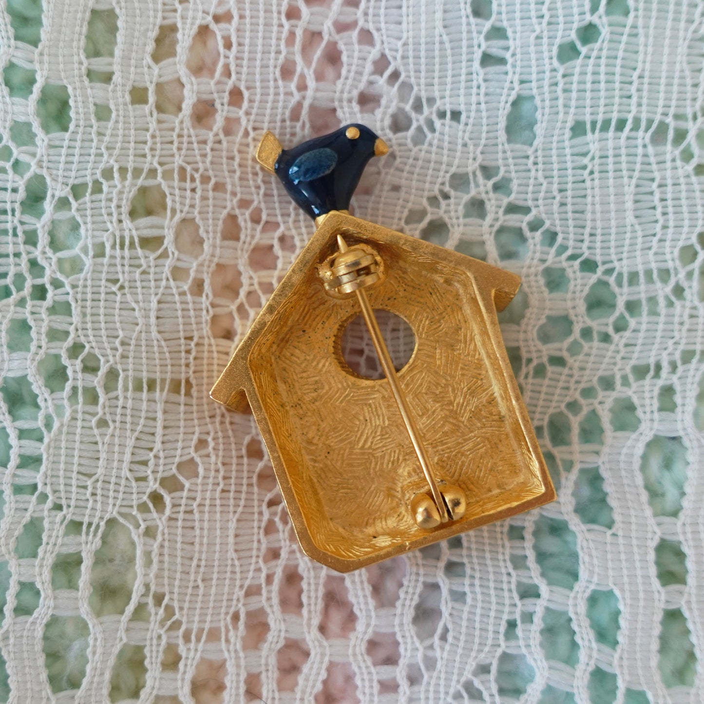 gold birdhouse pin