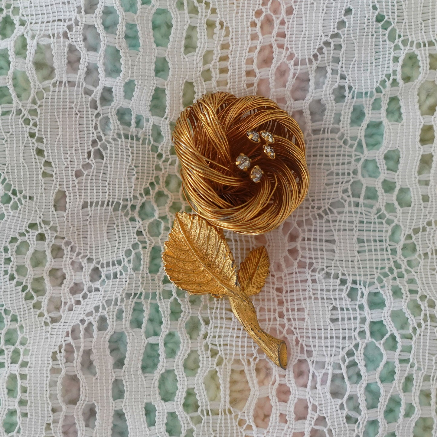 gold floral pin