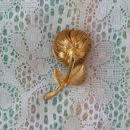 gold floral pin