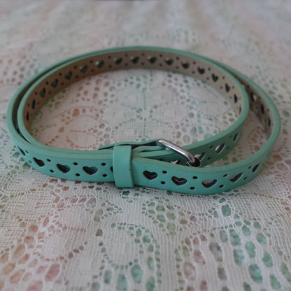teal belt with heart cutouts