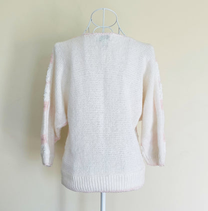 white and pink midsleeve sweater